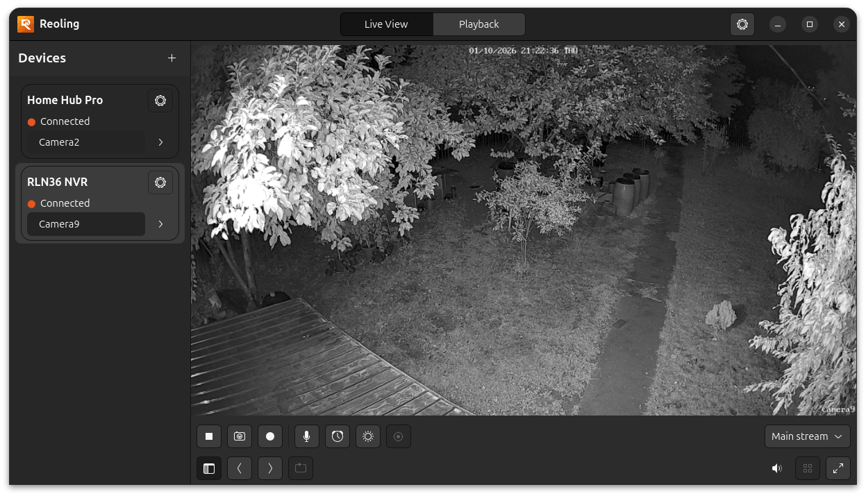 Reoling live view showing a night camera stream, Home Hub Pro and RLN36 NVR devices, and camera controls